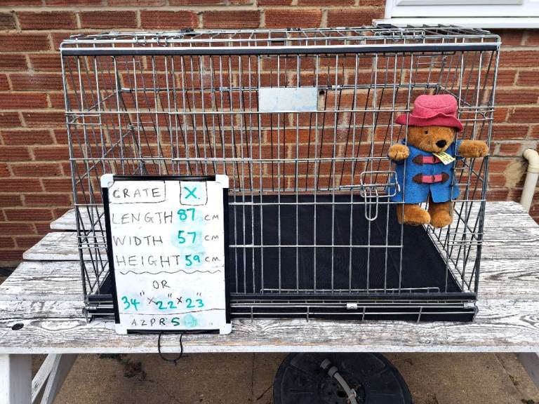 Sliding front dog crate for hatchback car