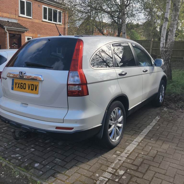 2010 Honda CR-V  2.2 Diesel , very good on consumption 50 MPG .