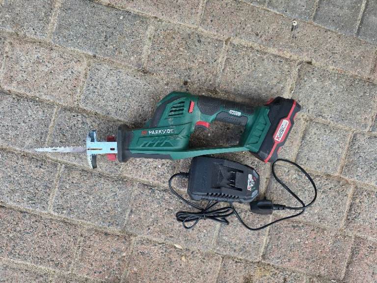 Parkside cordless reciprocating saw with battery and charger 