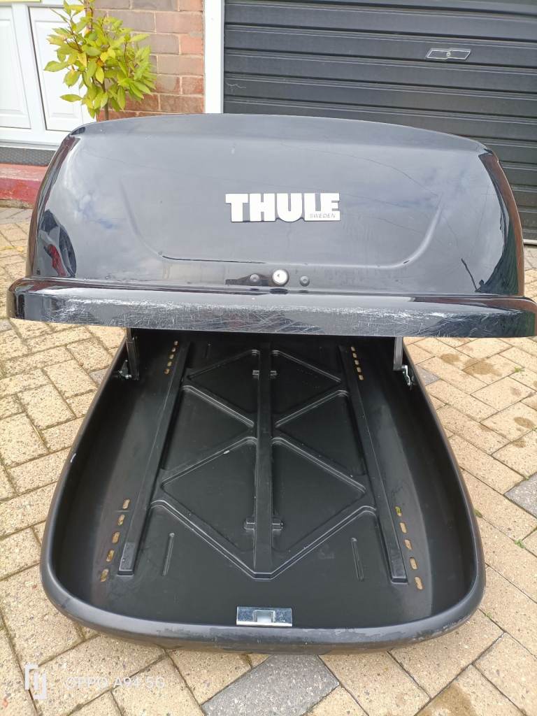 Thule roof box and roof rack for sale.