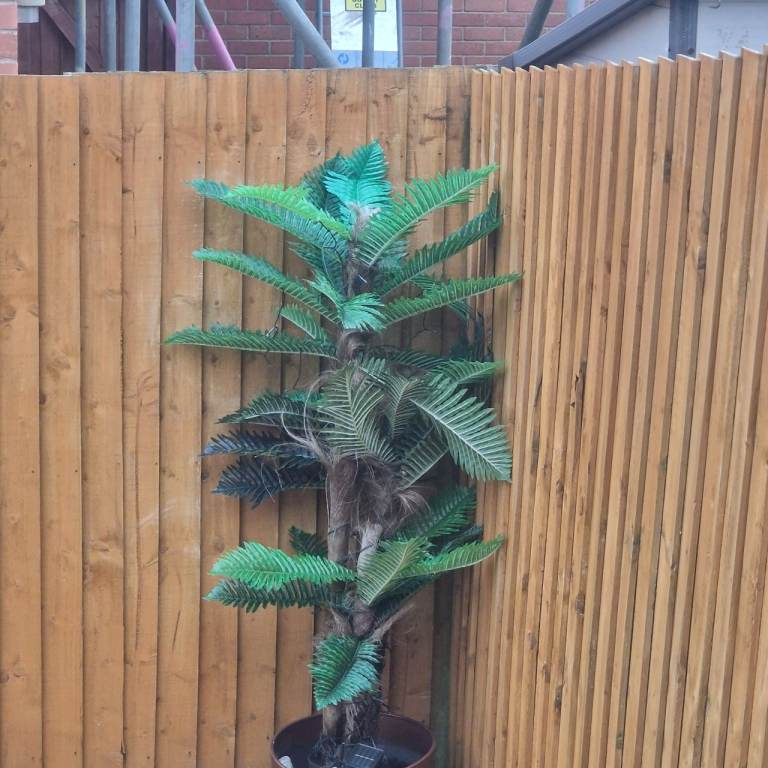 2x artificial palm trees