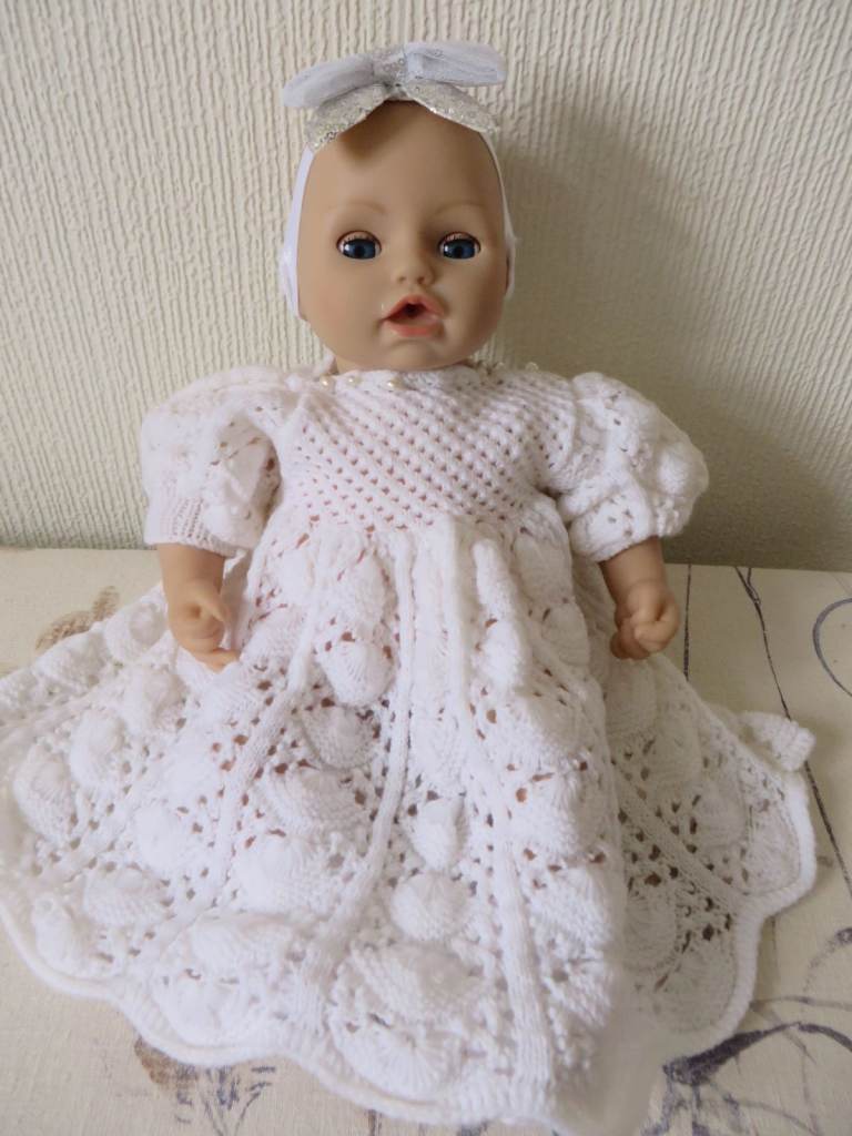 Lovely doll in Hand knitted dress new socks and a new headband