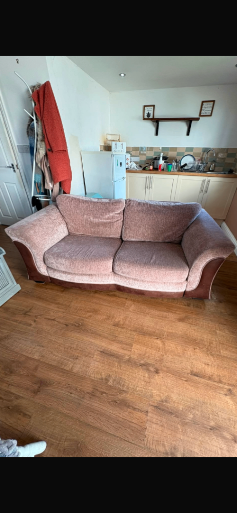 Metal framed large two seater sofa with mechanical bed pull out and nearly new mattress