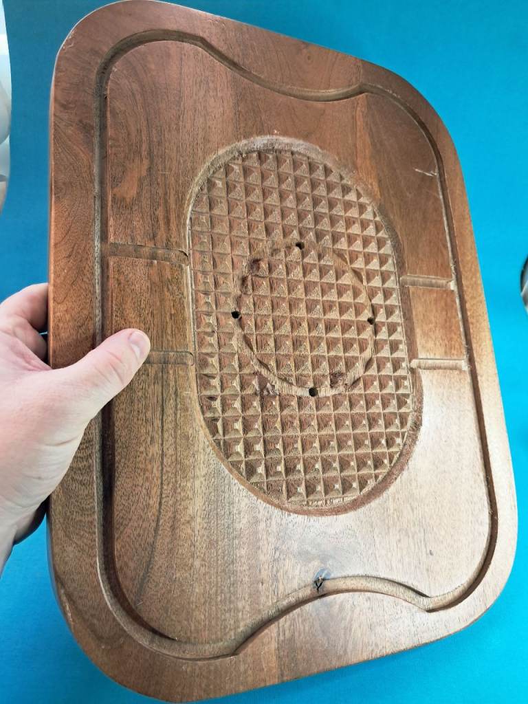 This is a Lipper International acacia steak carving board