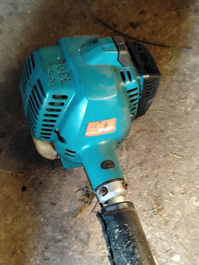 Makita strimer and an old electric chain saw, spares or repairs 