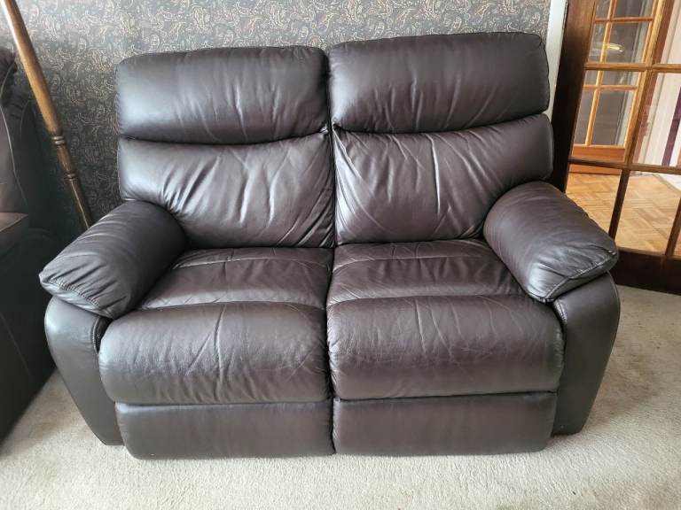 Brown Leather Two-Seater Sofa with Recliner Function – Good Condition