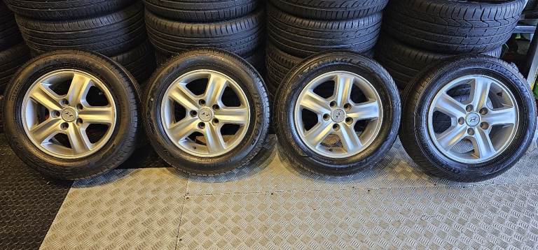 Hyundai Genuine 15 alloy wheels + 4 x tyres 185 65 15 Dunlop