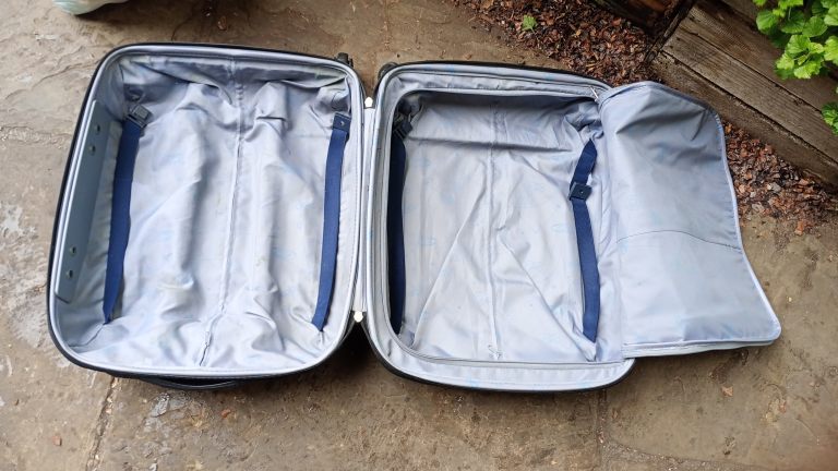 Small and strong suitcase on wheels