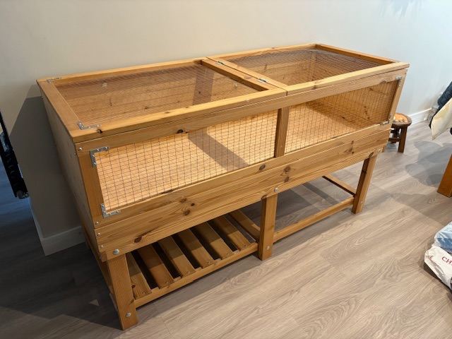Wooden animal hutch with removable lid
