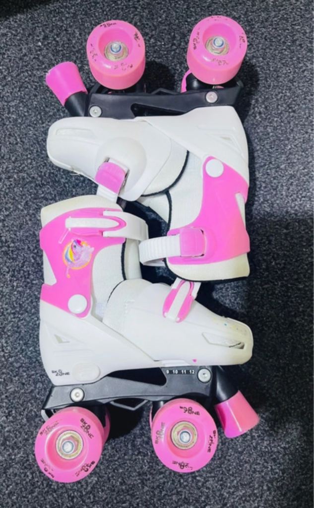 Girls pink roller skates