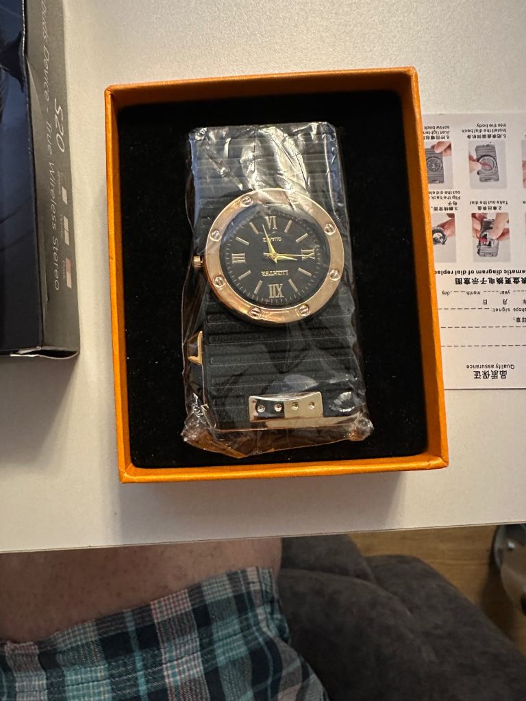 Gas lighter with combination clock