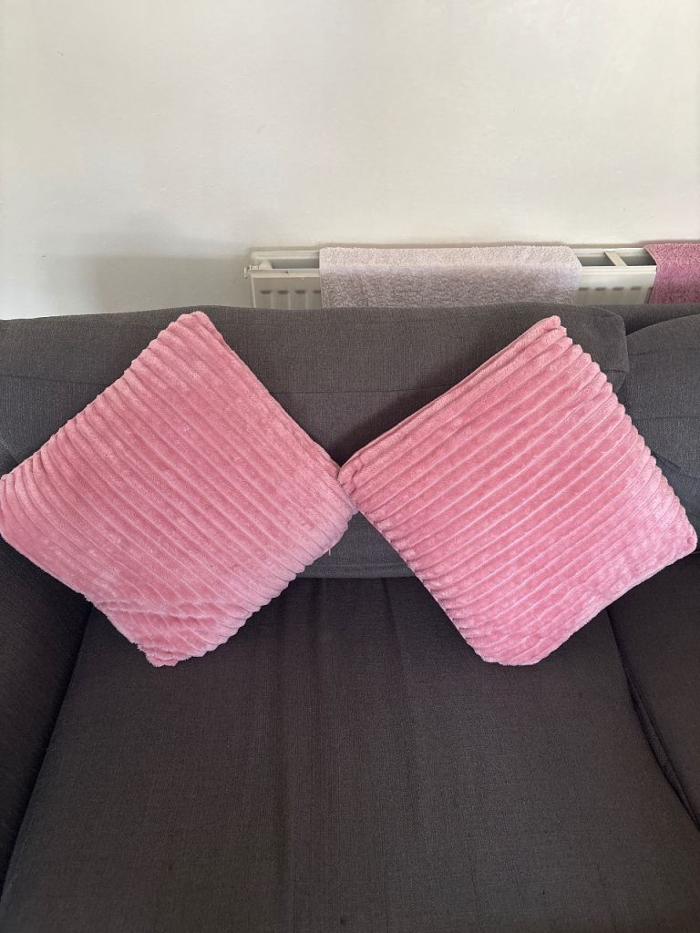 Pair of pink square cushions with insert s