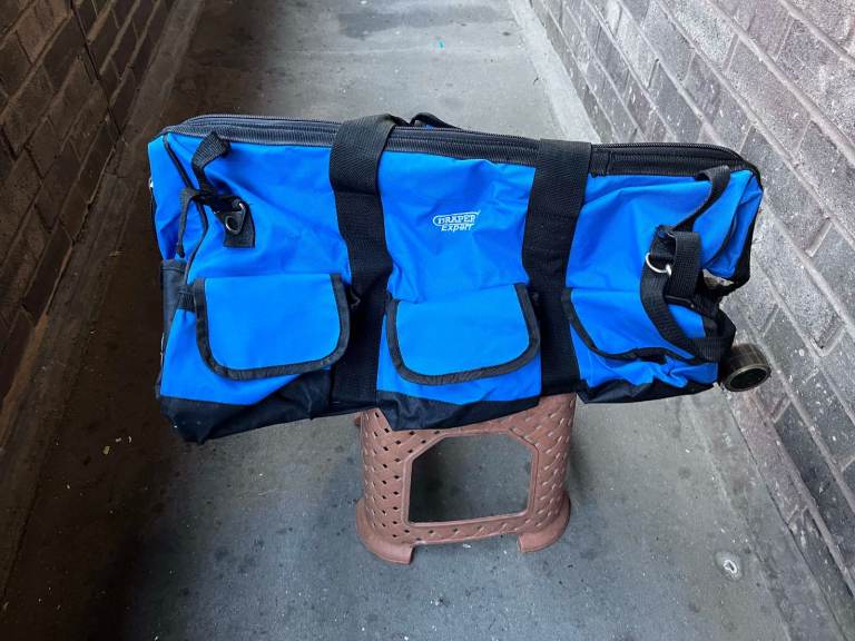 Draper Expert rolling tool bag, large capacity, on wheels with foldaway handle, can deliver 