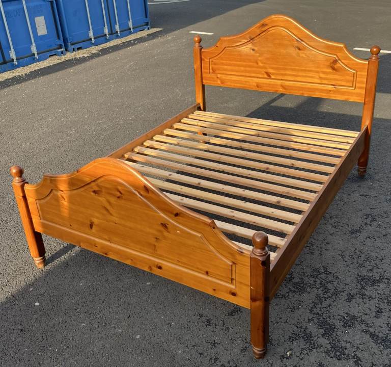 A SOLID PINE DOUBLE BED FRAME