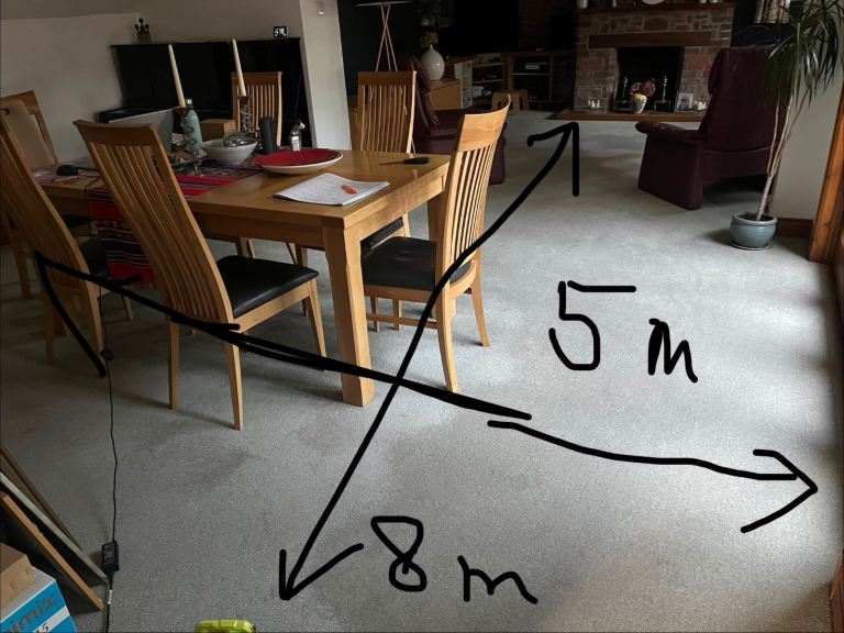 Large green grey used carpet about 5m x 8m with furniture marks