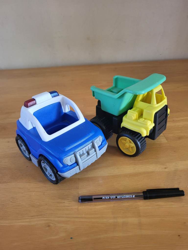 Kids police car and dump truck. Good condition.