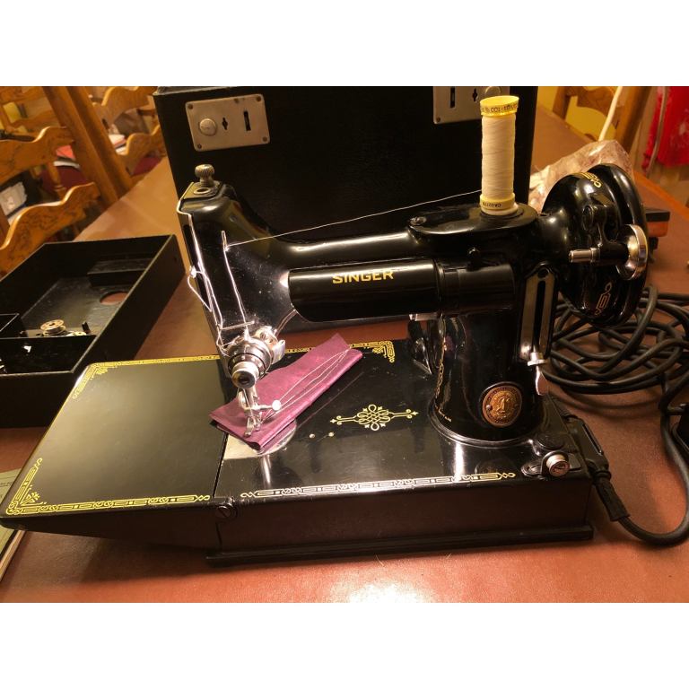 Singer sewing machine model 221k