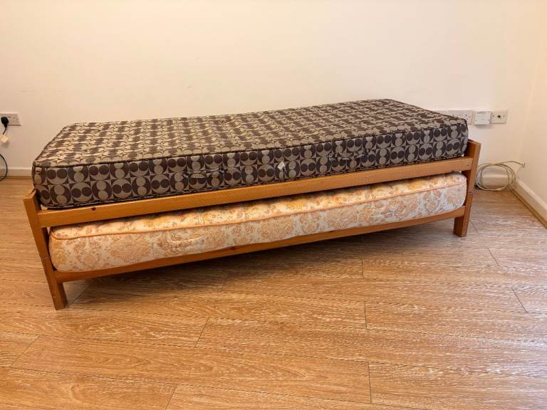 Trundle guest bed with mattresses.