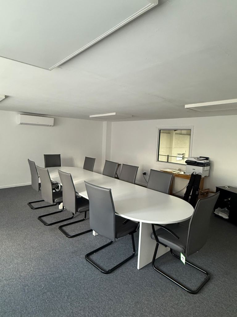 Full 10 person conference table with full set of office chairs