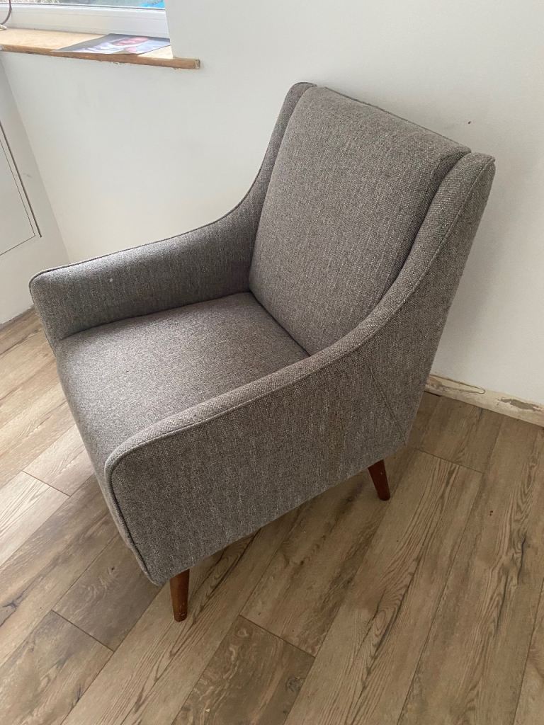 Grey fabric armchair