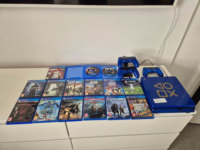 Sony (Days of Play) PS4 Console with 3 Controllers and 15 Games
Limited Edition