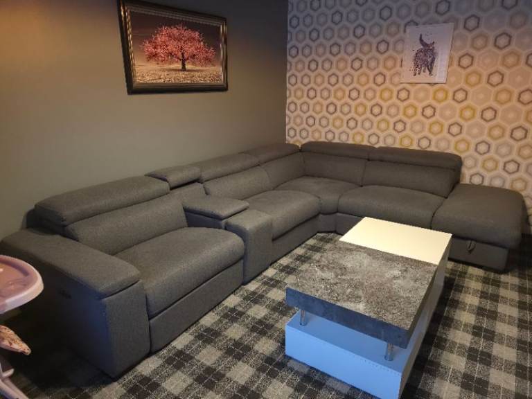 Grey L-Shaped Sofa, with electronic recliner, integrated sockets, and Storage