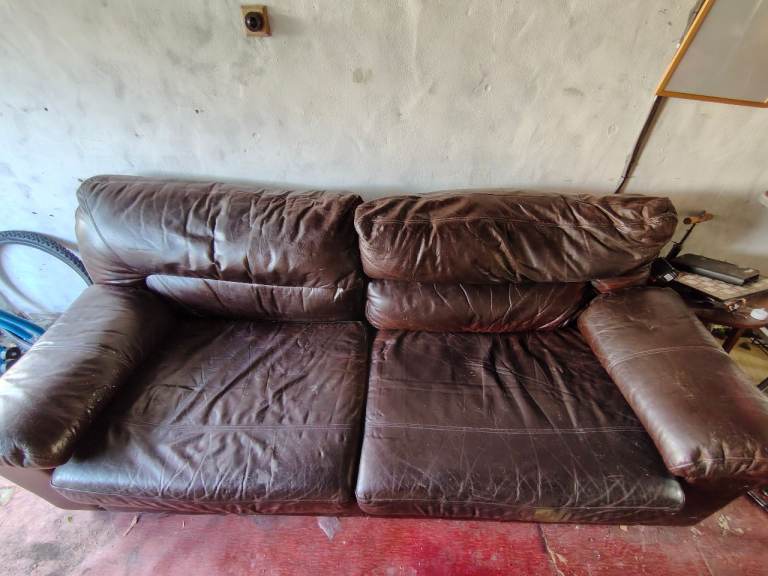 Brown Leather Two-Seater Sofa – Fair Condition
