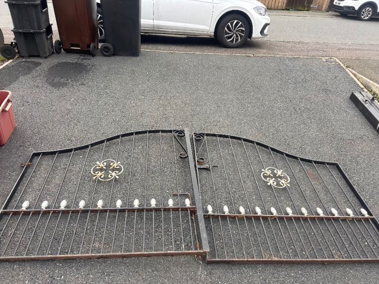 Beautiful set of metal gates & posts 