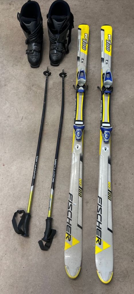 image for Skiis with bindings, poles and boots