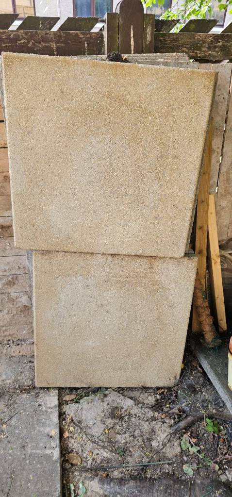 NOW GONE. Free paving slabs – 14 unused 600mm x 600mm textured buff slabs
