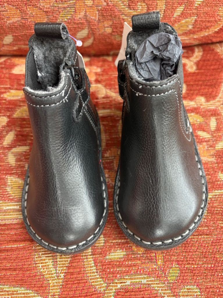 Pair of child’s slip on leather boots black size3