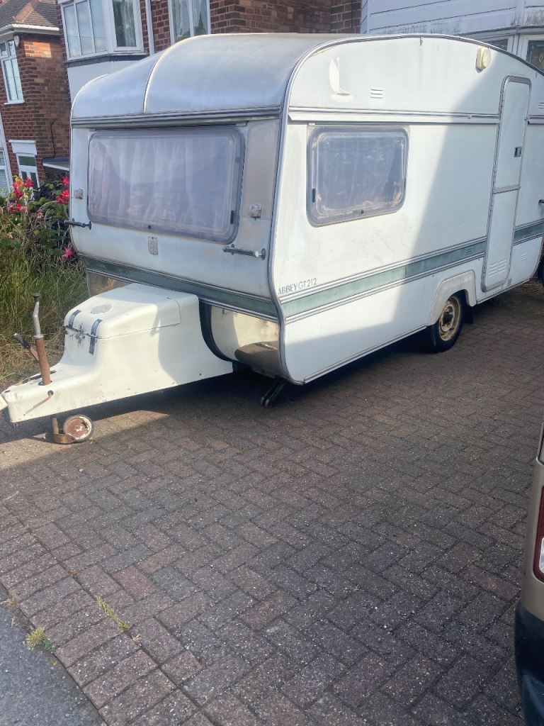 Small easy to tow/store caravan with bespoke built-in internal door for security.