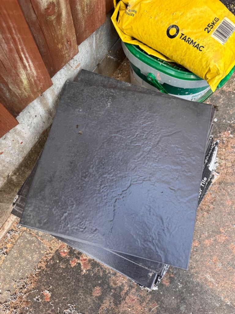 Dark grey tiles surplus, 3 full packs plus 3 individual ones.