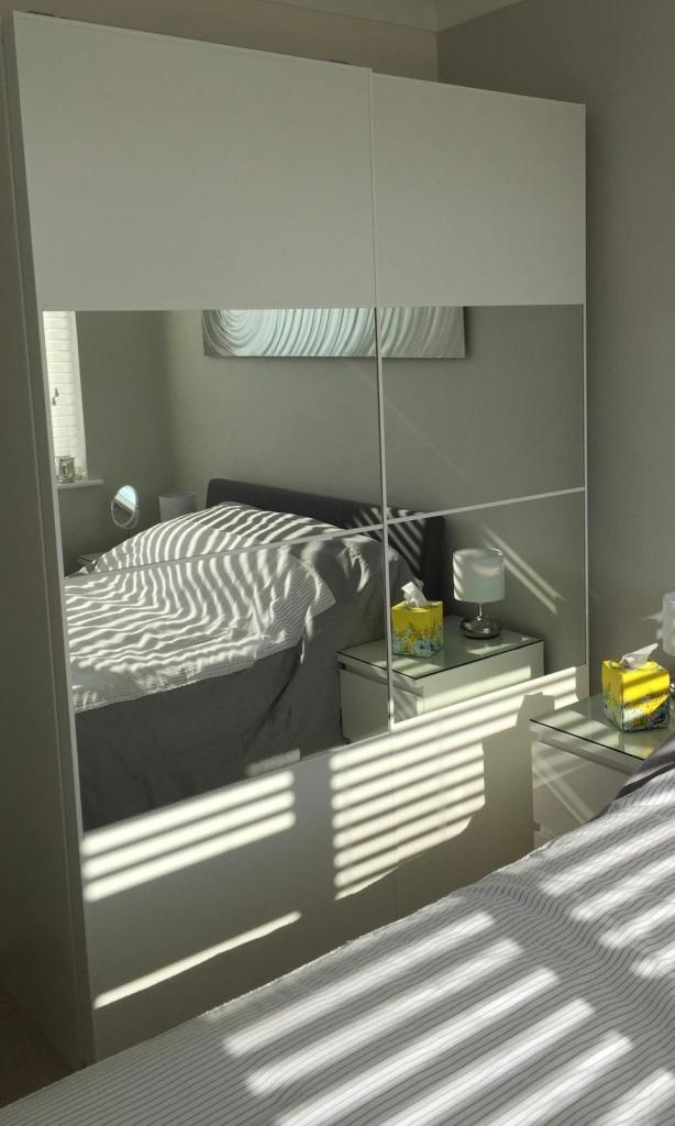 IKEA PAX / AULI Wardrobe with sliding doors, white/mirror glass, 150x66x201 cm