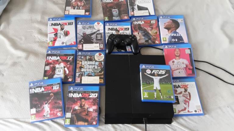 Sony PlayStation 4 Console with Controller and Games – Good Condition