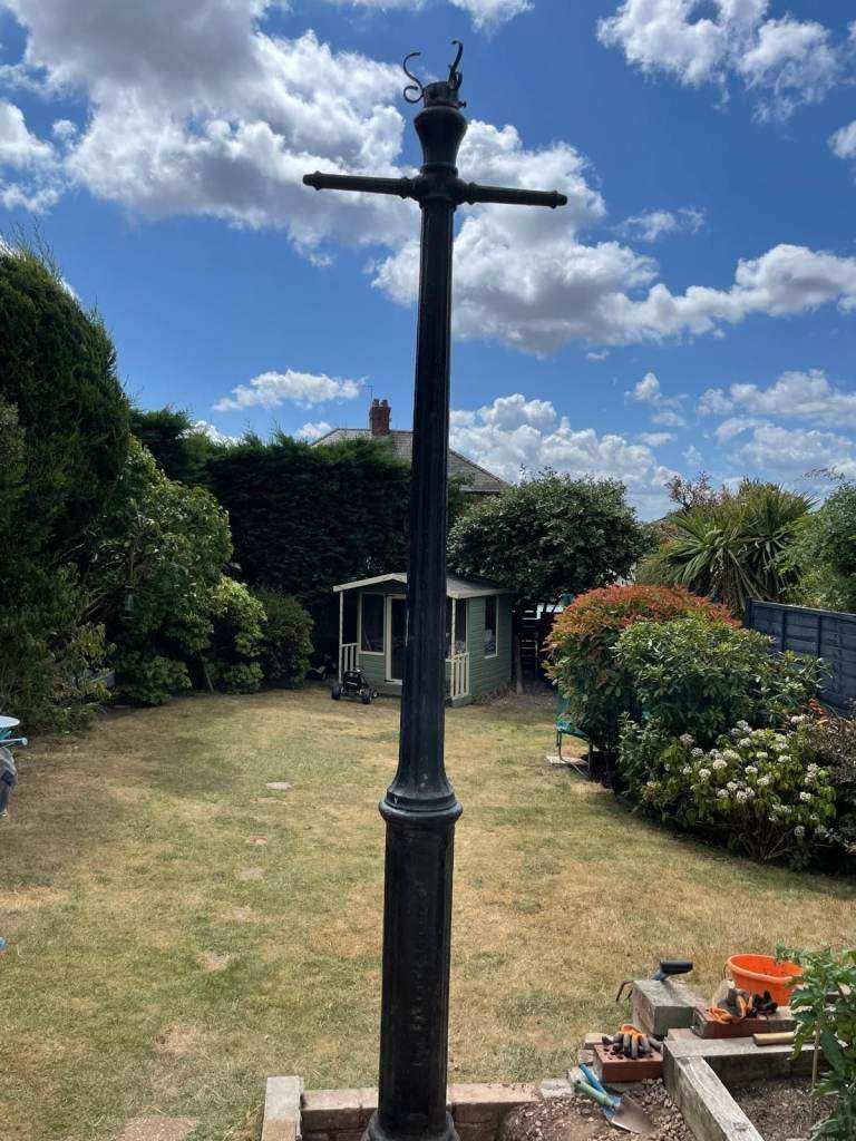 Antique cast iron street lamp and copper lantern