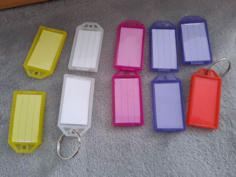 10 new multicoloured name tag plastic keyrings 