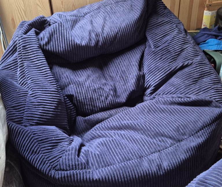 Two comfy large Icon bean bags in ribbed navy corduroy fabric