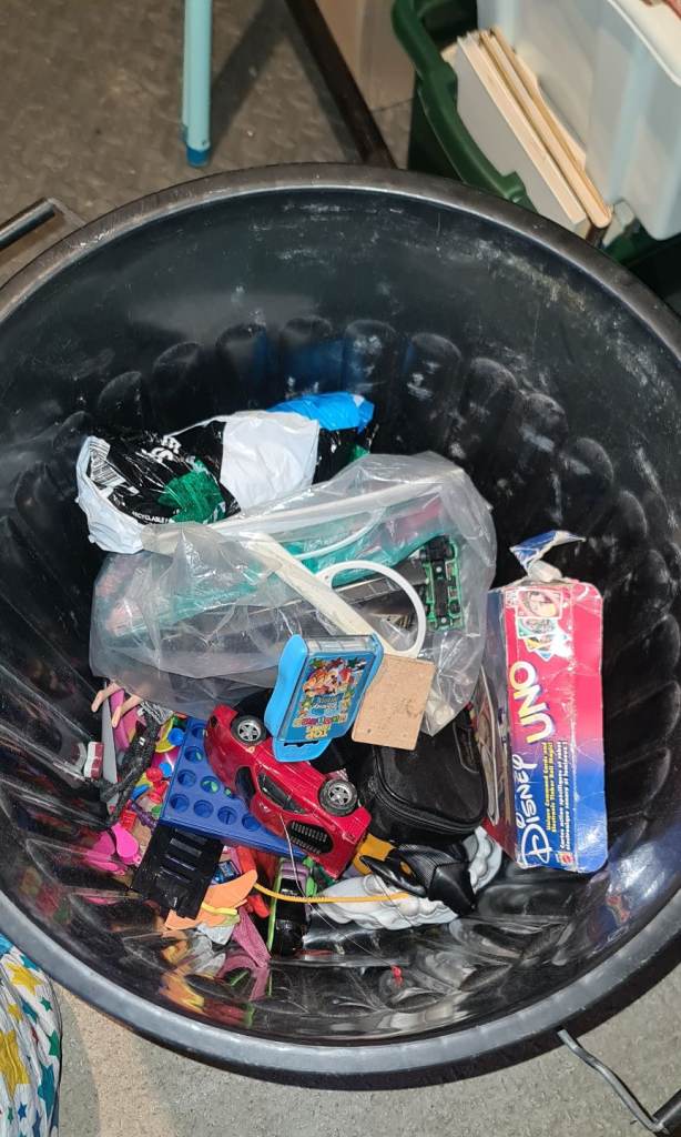 Half bin of toys