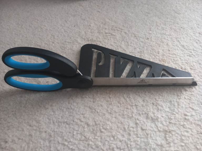 Pizza cutter.  Buyer to collect.