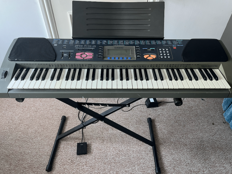 Casio WK-1200 Electronic Keyboard with Stand and Pedal