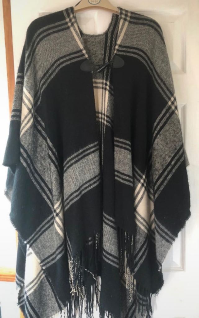 Stylish Black and White Plaid Poncho with Toggle Fastening