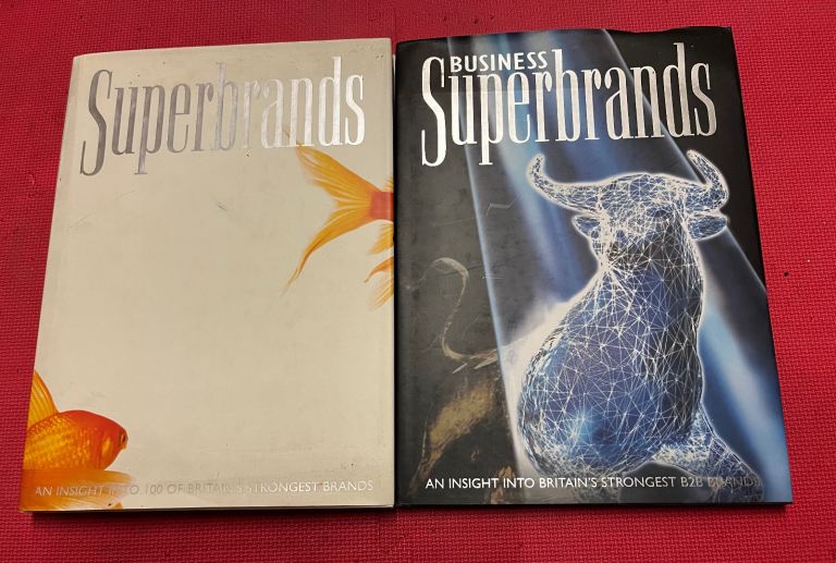 Two Superbrands books for marketing students / adverting agency