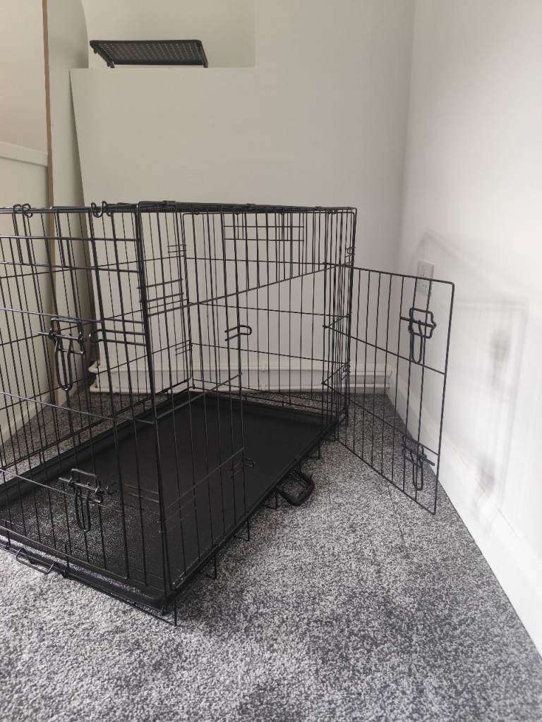 Dog crate - like new. W91 x D61 x H67 cm