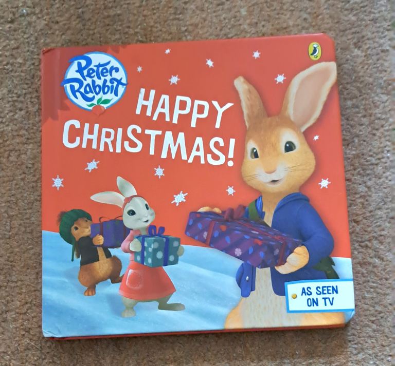 Peter Rabbit Happy Christmas book.