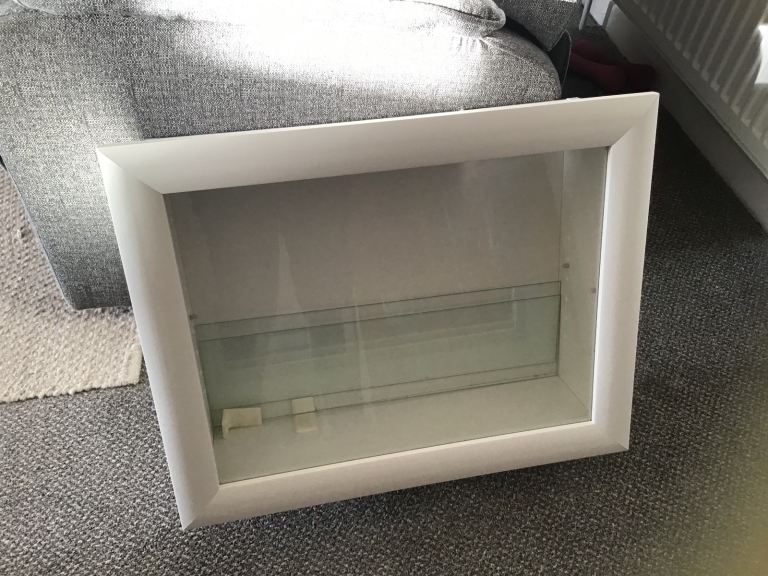 White wall display cabinet with 2 glass shelves.