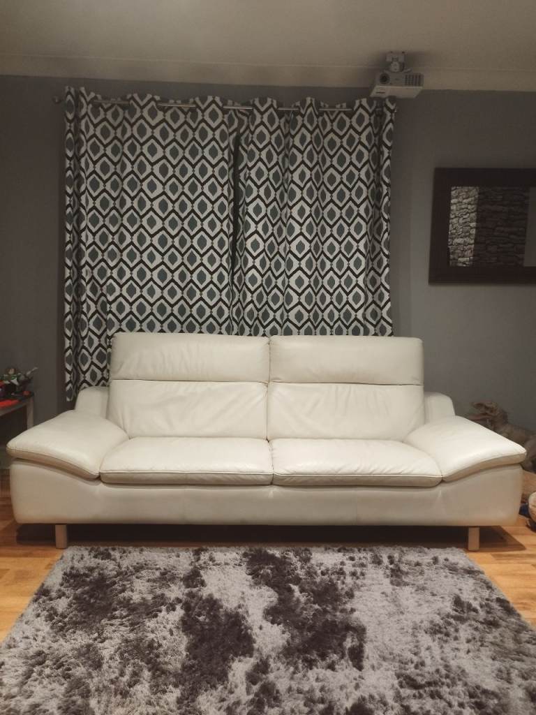 Cream Leather Two-Seater Sofa – Good Condition