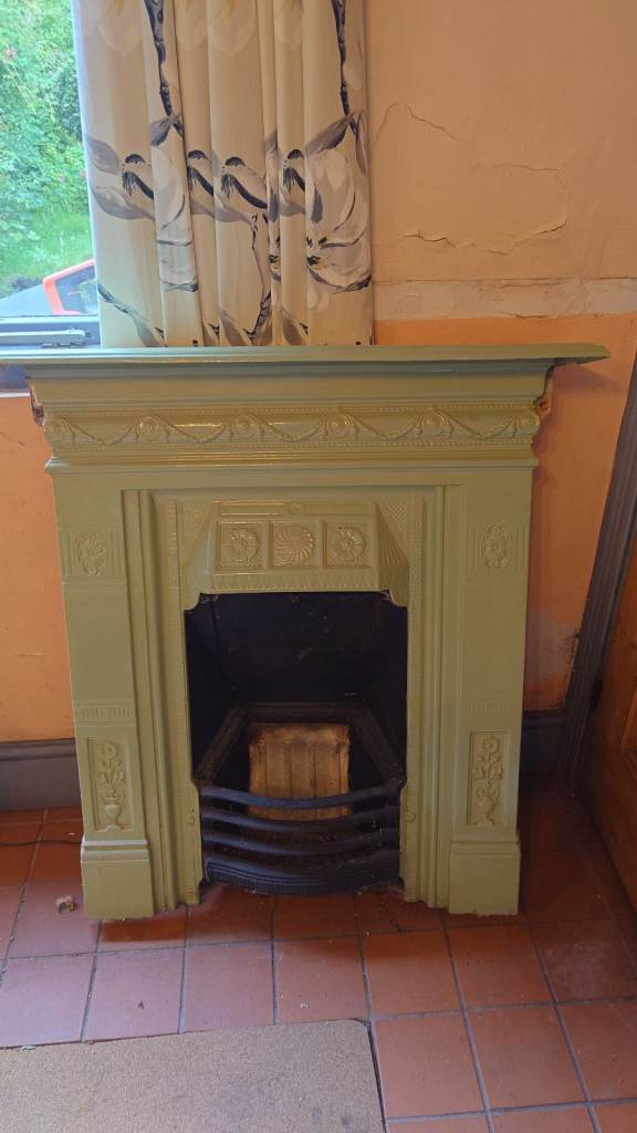 Cast Iron Fireplace (ca. 1912)