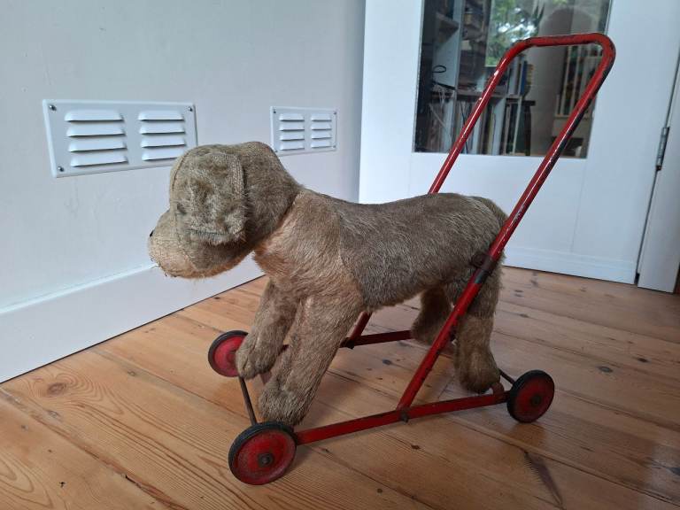 Vintage Merrythought push-along dog