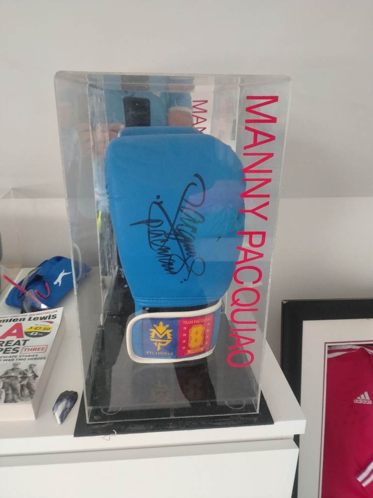 ***HALF PRICE*** Manny Pacqiou Signed and caged glove (rare) 